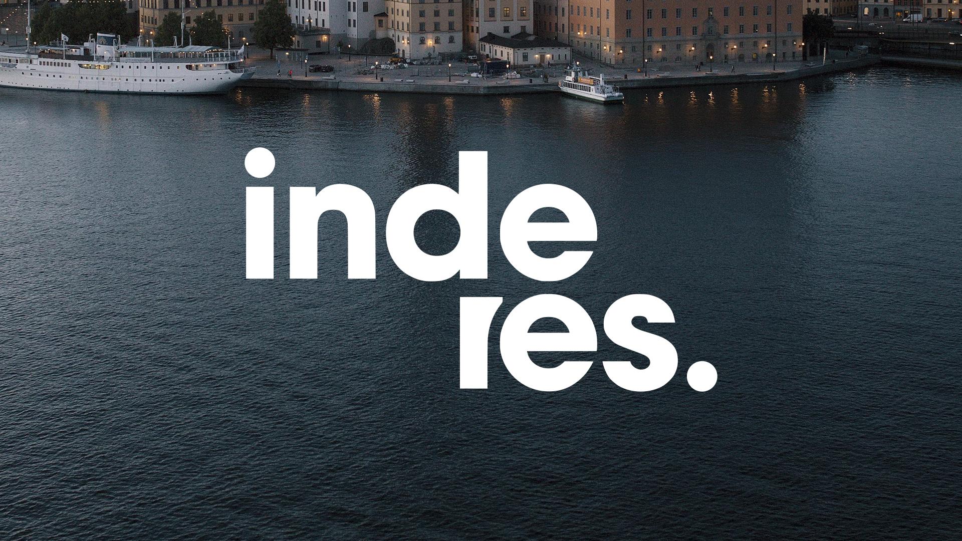 White Inderes logo over a photograph — correct usage